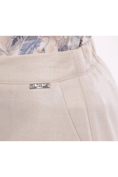 Pantalón acampanado laminado